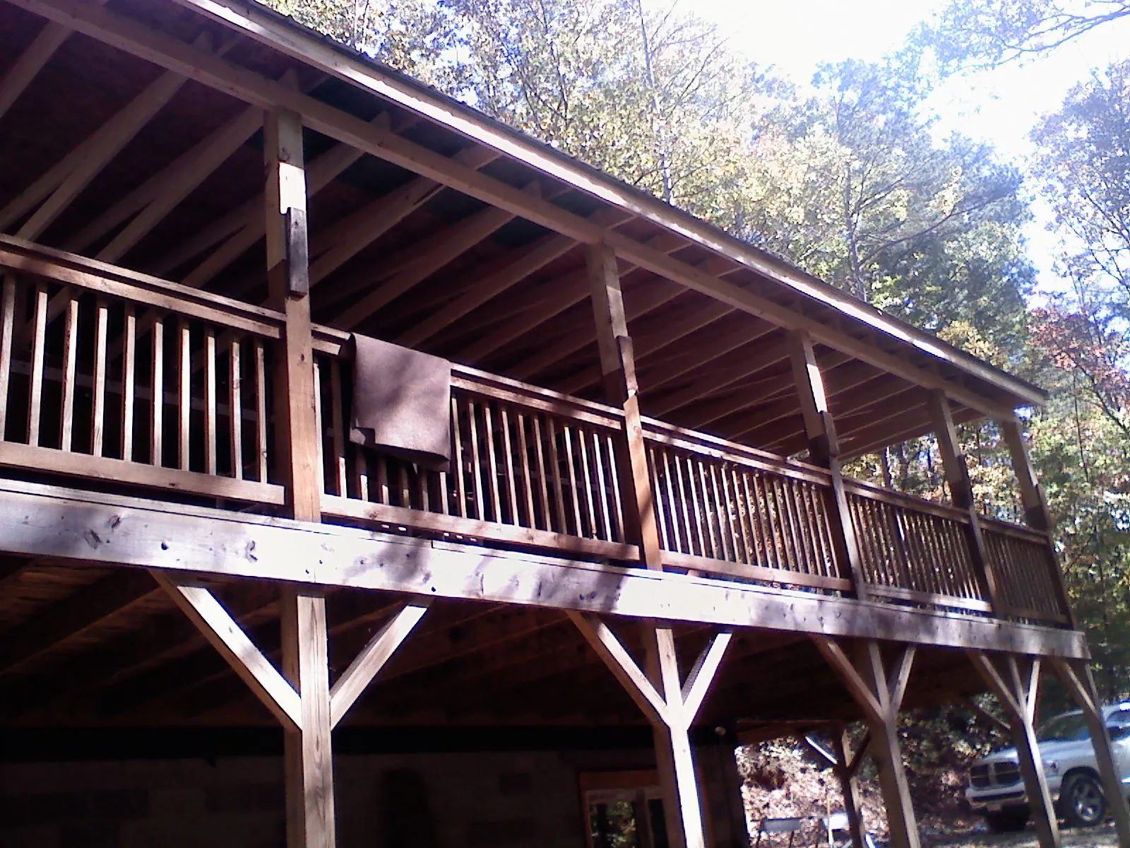Timber framing under a new elevated porch and deck — Roof Leak Repair in North Chatham by Roofing Brothers